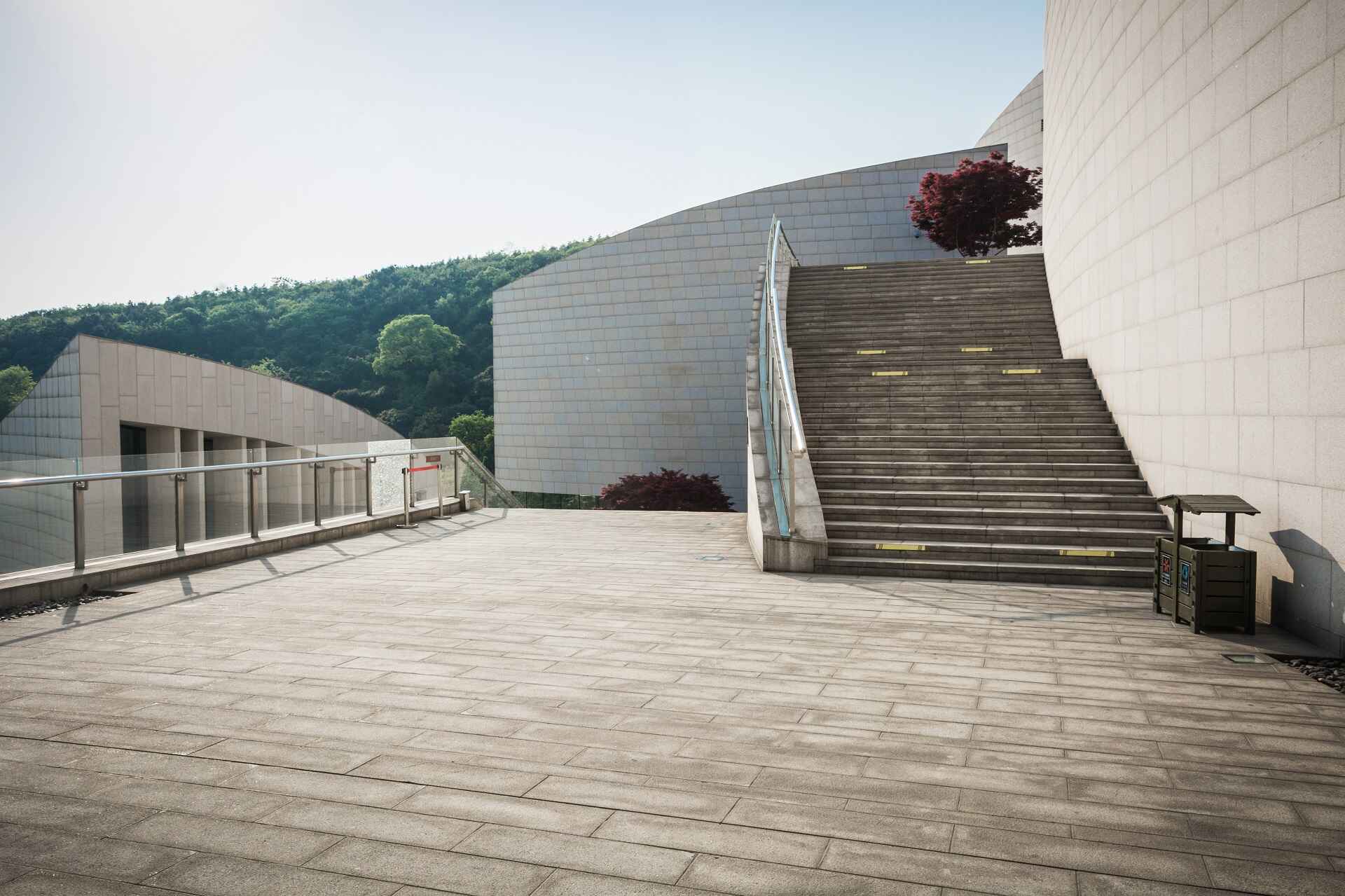 Concrete sidewalk with stairs showing clean installation